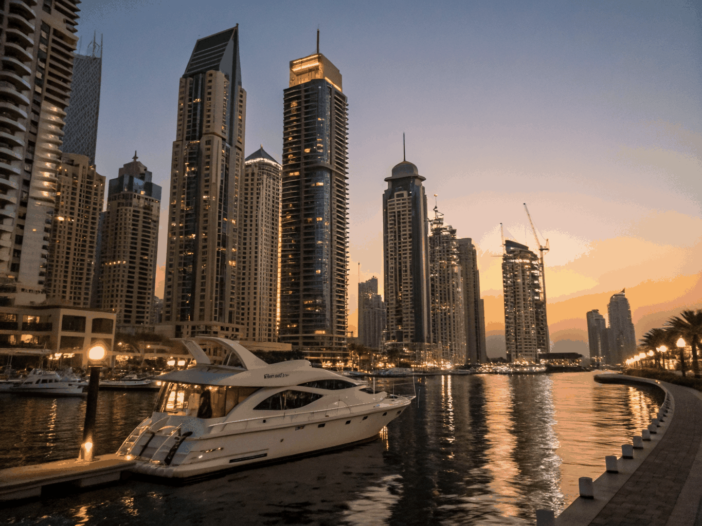 Dubai Marina skyline and luxury waterfront properties at golden hour